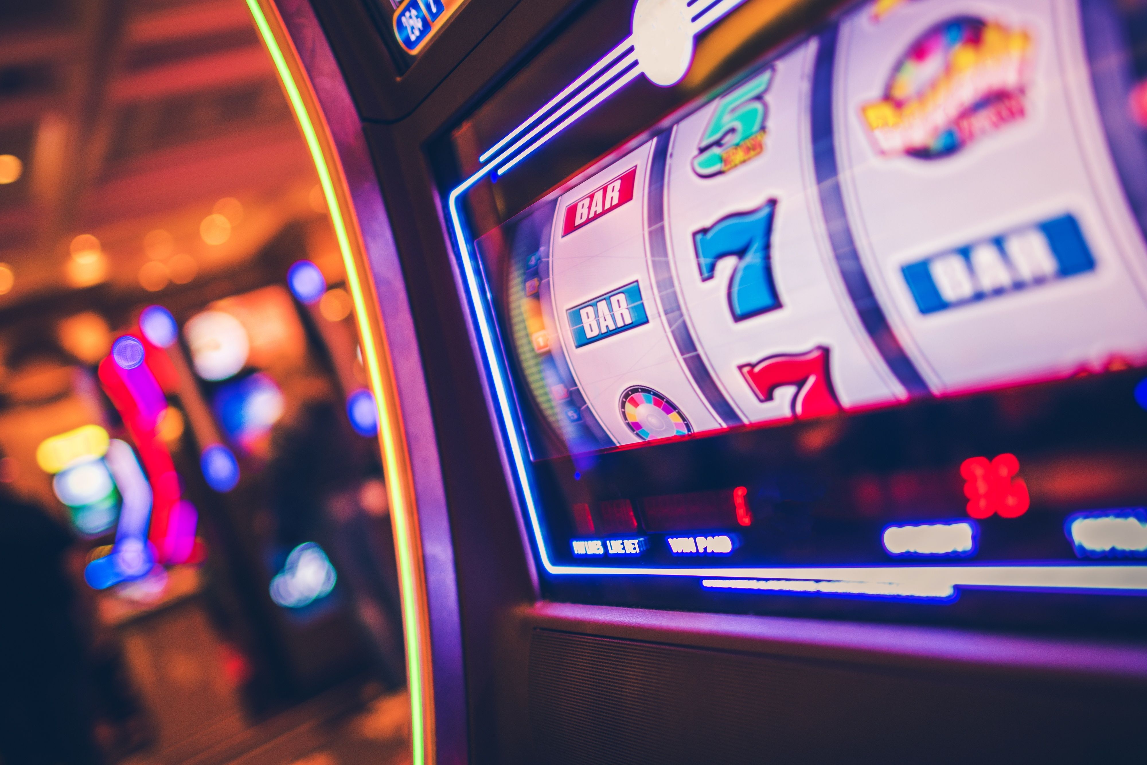 sumsumslot live game show host on set with spinning wheel and real-time betting interface overlaid